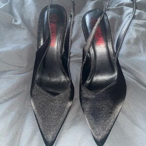 George Shimmering Black Slingback Heels